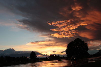 Scenic view of dramatic sky during sunset