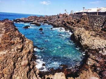 Scenic view of sea against clear blue sky