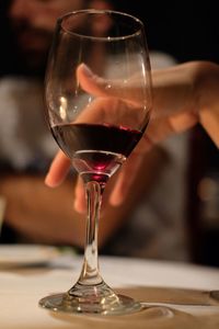 Close-up of wineglass on table