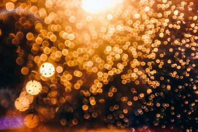 Defocused image of illuminated christmas lights