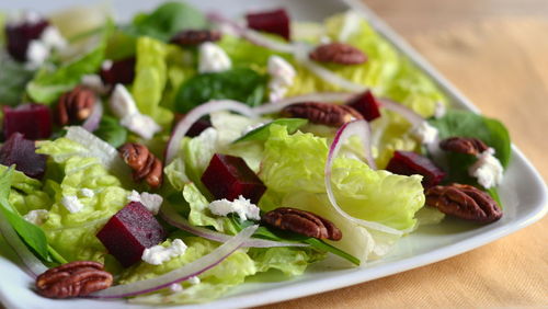 Close-up of salad served on table