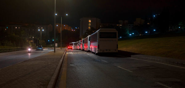 View of illuminated street at night