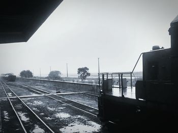 Railroad tracks against clear sky