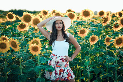 Full length of woman standing on field