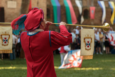 Man playing trumpet during event