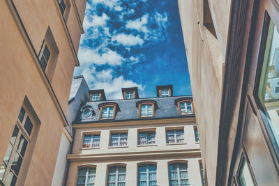 Low angle view of residential building against sky