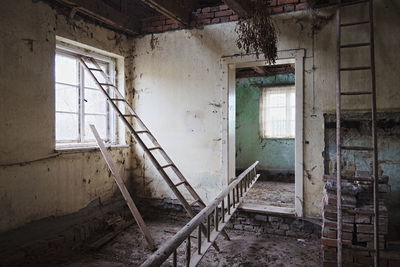 Old ladders in an old abandoned and decayed building