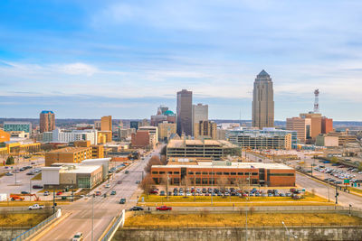 High angle view of buildings in city against sky