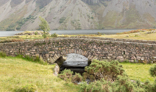 View of stone bridge over mountain