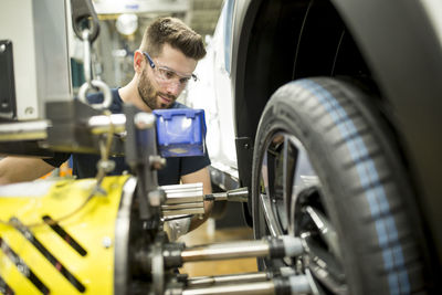 Man working in modern car factory