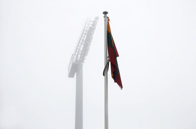 Low angle view of flag against white background