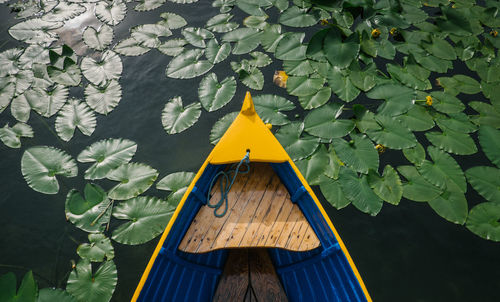 High angle view of boat moored on pond