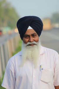 Portrait of man standing outdoors