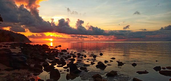 Scenic view of sea against sky during sunset