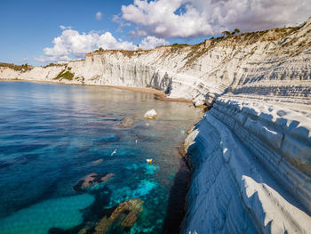 Panoramic view of rock formations against sky