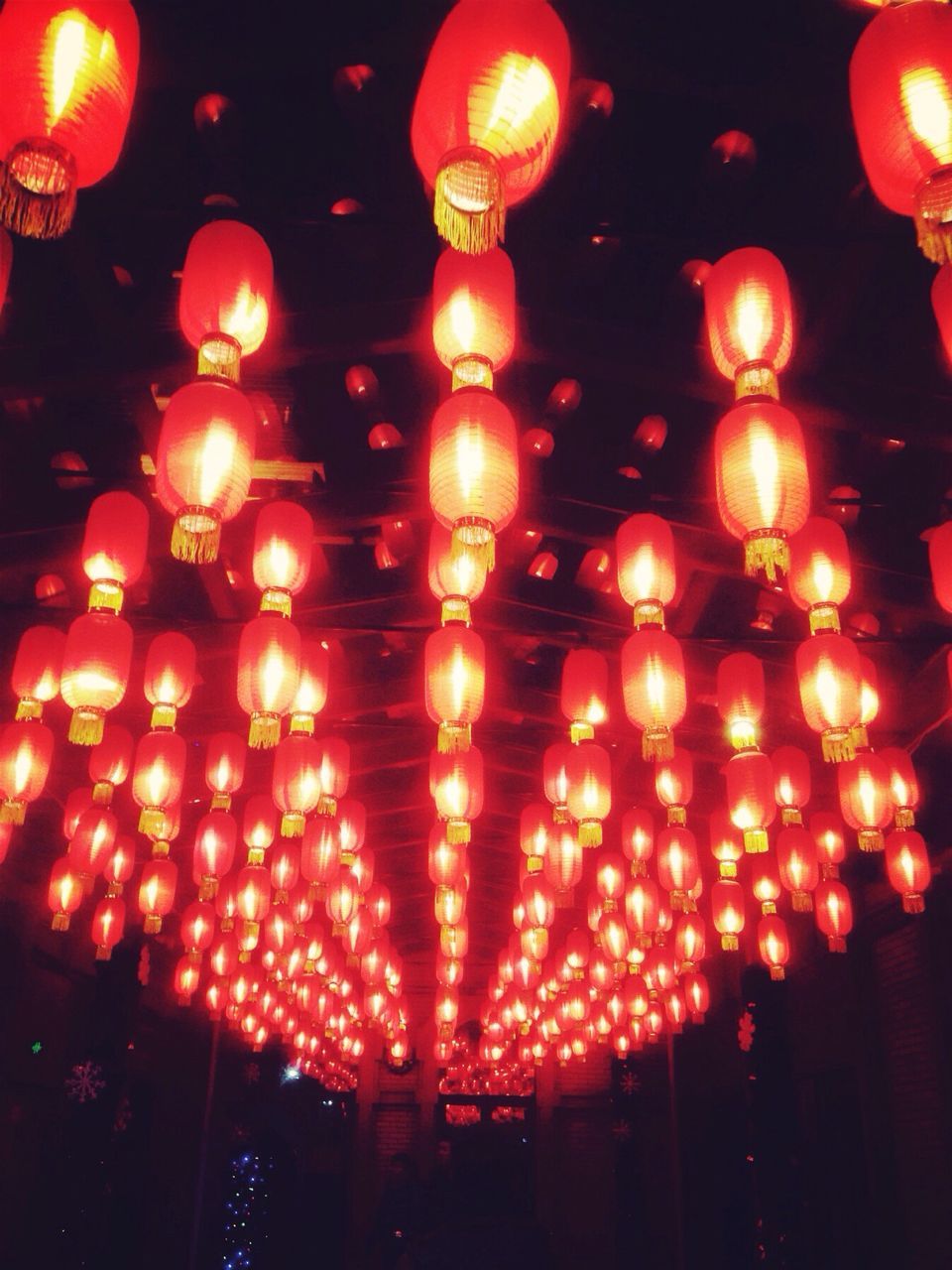 illuminated, lighting equipment, night, low angle view, hanging, decoration, lantern, glowing, celebration, indoors, electric light, light - natural phenomenon, chinese lantern, electricity, ceiling, in a row, tradition, red, cultures, pattern