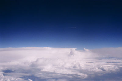 Aerial view of clouds against blue sky