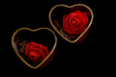 Close-up of rose bouquet against black background