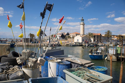Boats moored at harbor