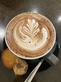 High angle view of flat white on table