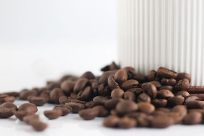 Close-up of coffee beans on table