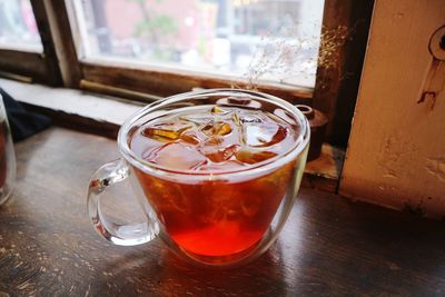 Close-up of tea in glass on table