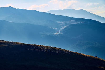 Scenic view of mountains against sky