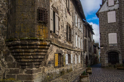 Low angle view of old building against sky