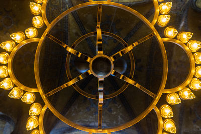 Low angle view of ceiling and light fixtures in hagia sophia
