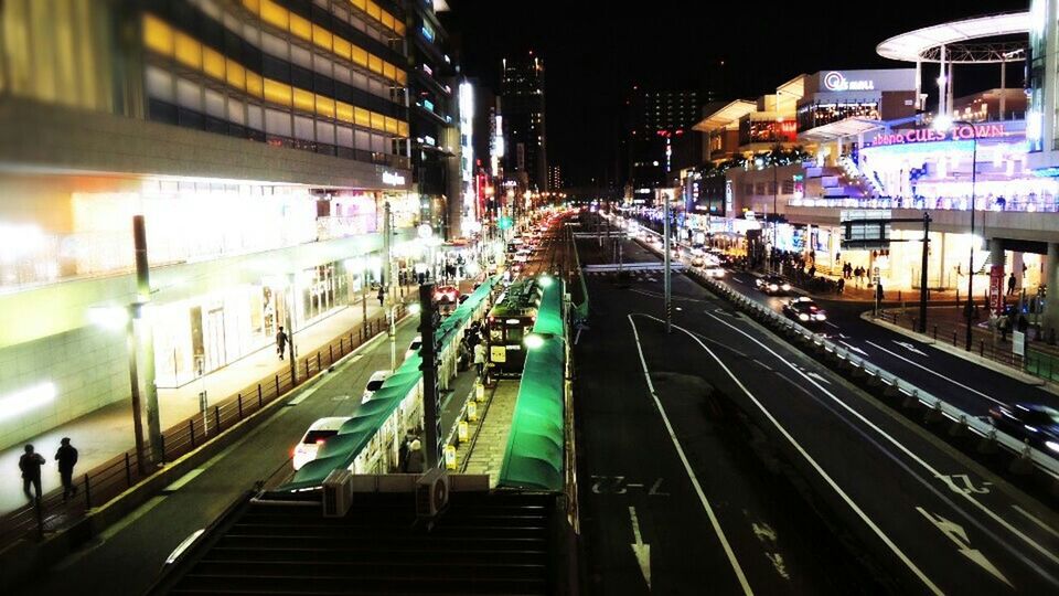 transportation, illuminated, high angle view, mode of transport, built structure, public transportation, railroad track, city, architecture, night, city life, on the move, building exterior, railroad station, traffic, railroad station platform, travel, rail transportation, motion, the way forward