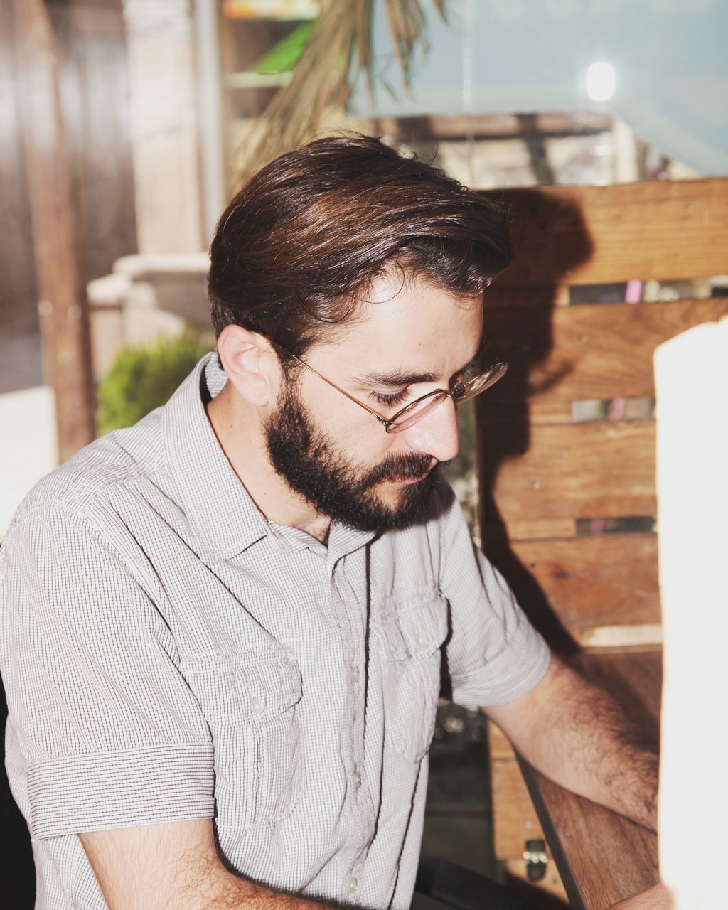 lifestyles, leisure activity, casual clothing, headshot, mid adult, focus on foreground, mid adult men, portrait, contemplation, close-up, outdoors, day