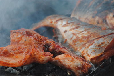 Close-up of meat on barbecue grill