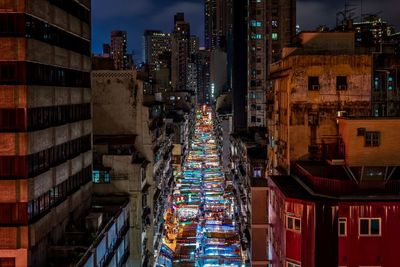 Illuminated buildings in city at night