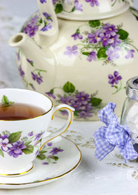 Close-up of elegant retro teapot on table