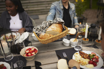 Friends having meal in garden