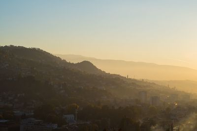 High angle view of townscape against sky during sunset