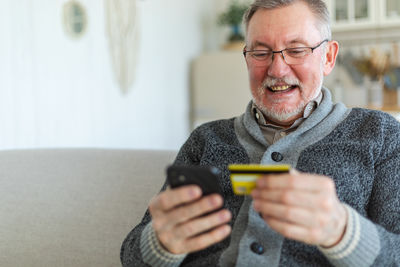 Young man using mobile phone