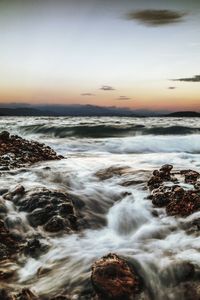 Scenic view of sea against sky during sunset