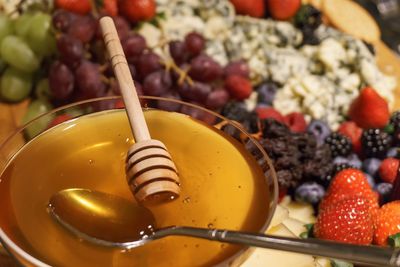 Close-up of honey in bowl at home