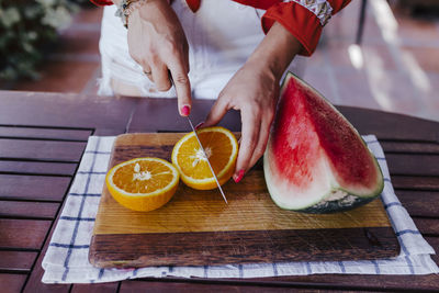 High angle view of woman preparing food