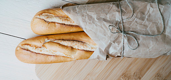 High angle view of bread on cutting board