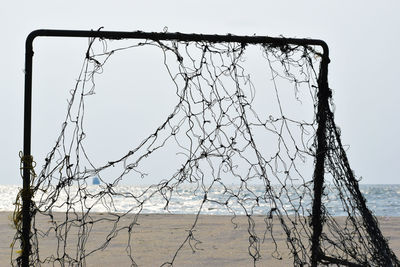 View of damaged beach against clear sky