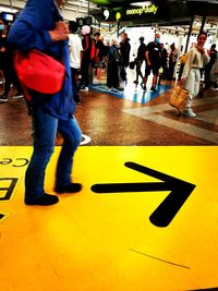 People walking on road sign