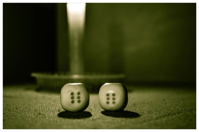 Close-up of dices on table