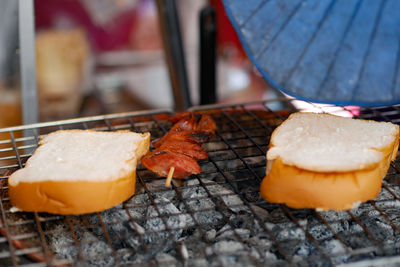 Close-up of bread on barbecue grill