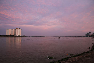 Scenic view of sea against sky at sunset