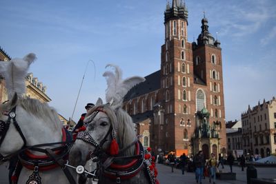 Statue of cathedral against sky in city