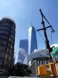 Low angle view of skyscrapers against sky