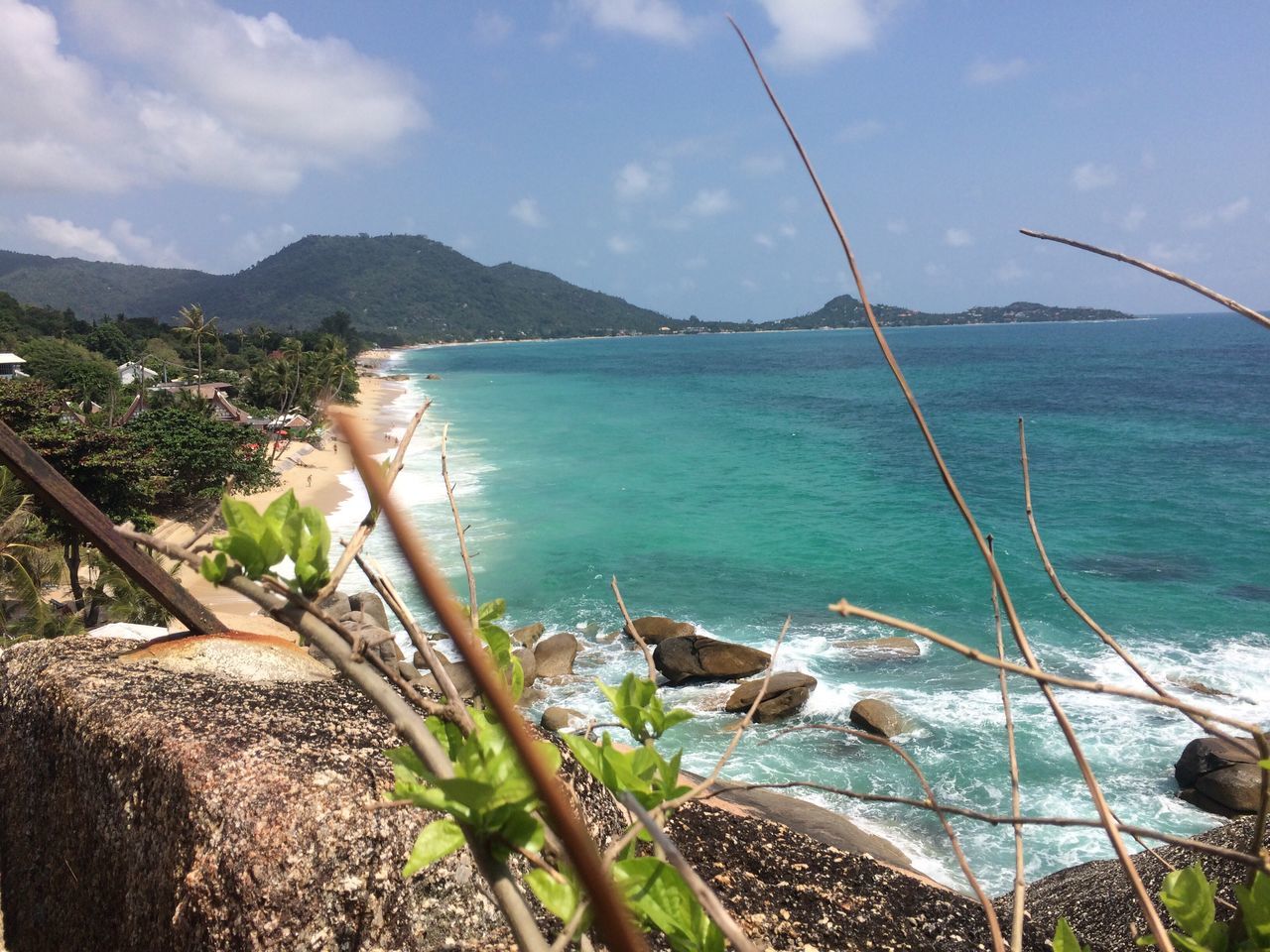 sea, water, sky, nature, beauty in nature, scenics, beach, outdoors, tree, mountain, tranquility, tranquil scene, no people, day, sand, palm tree, architecture, seashore