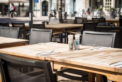 Empty chairs and tables at cafe